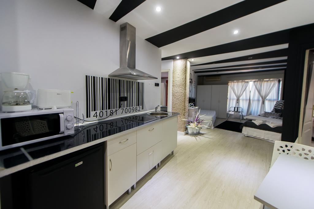 Apartamentos Los Angeles Alcaniz Bagian luar foto