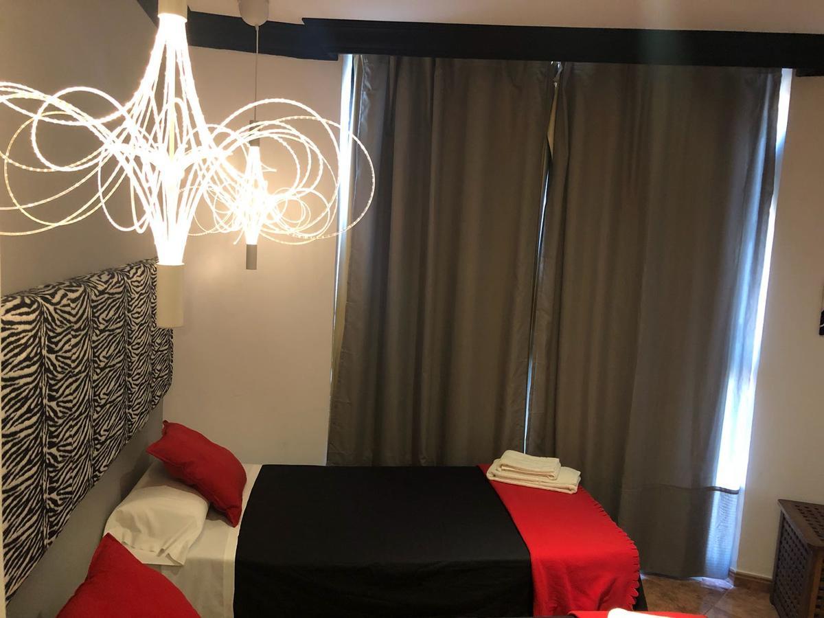 Apartamentos Los Angeles Alcaniz Bagian luar foto