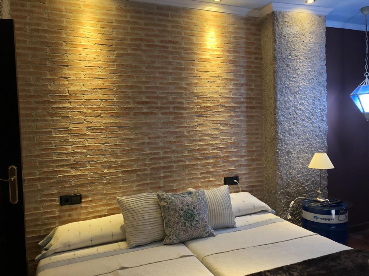 Apartamentos Los Angeles Alcaniz Bagian luar foto